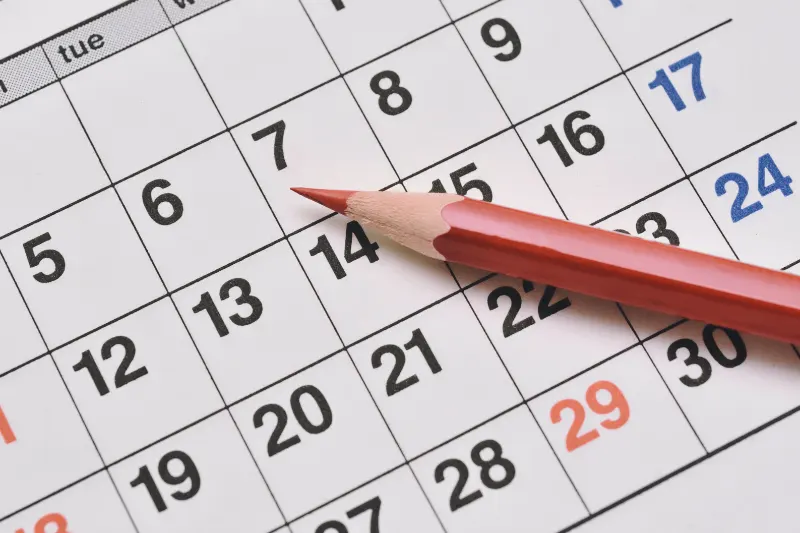 Scheduling1 A calender, with a red pencil